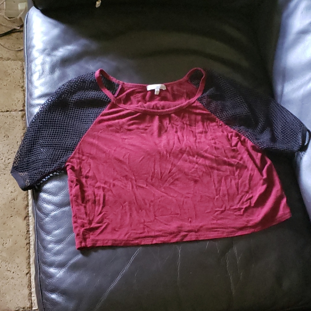 Red crop top with black mesh sleeves